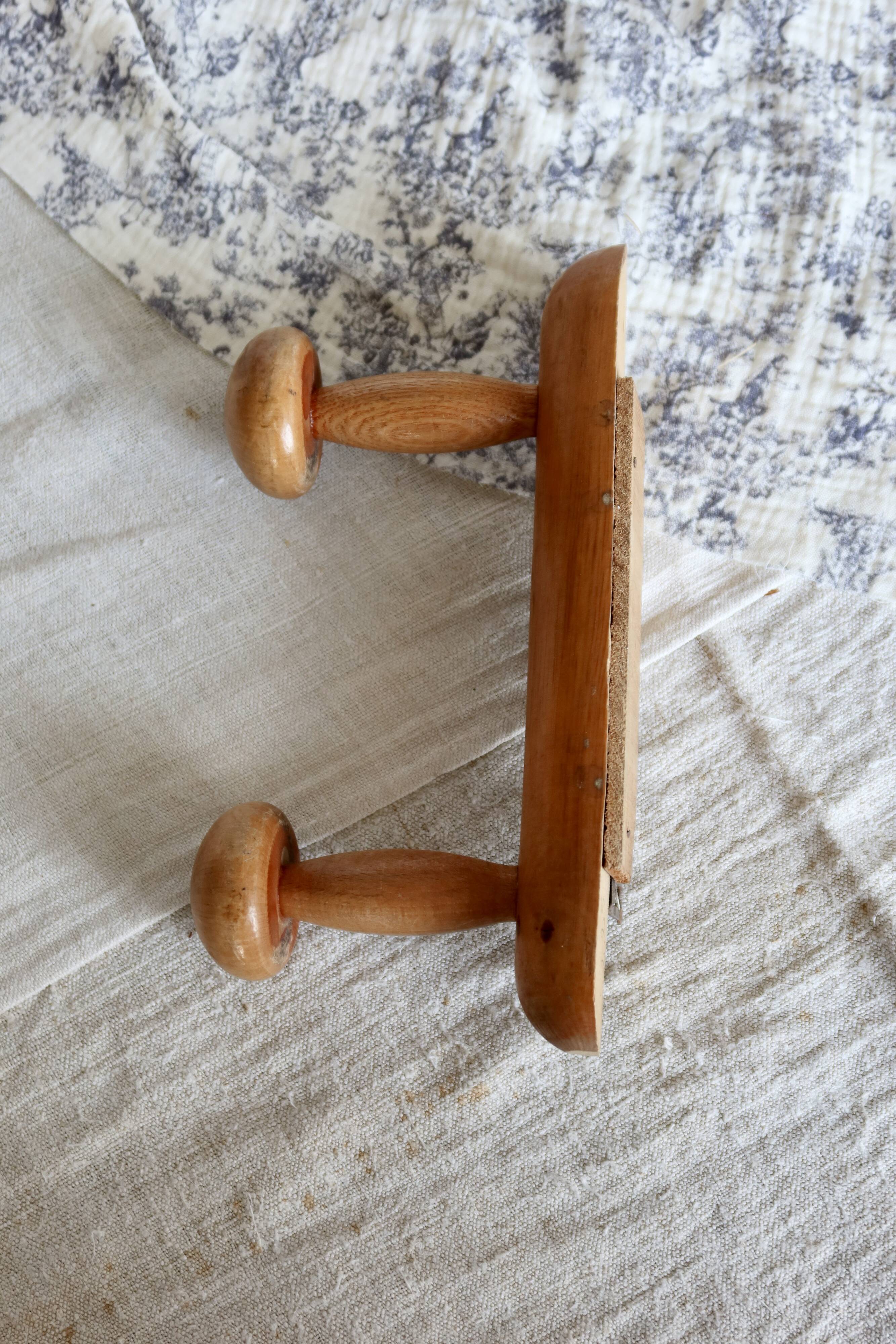 Antique wooden coat rack with two round hooks