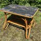 Table basse vintage en rotin et Formica