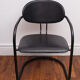 Fauteuil noir pieds en arc