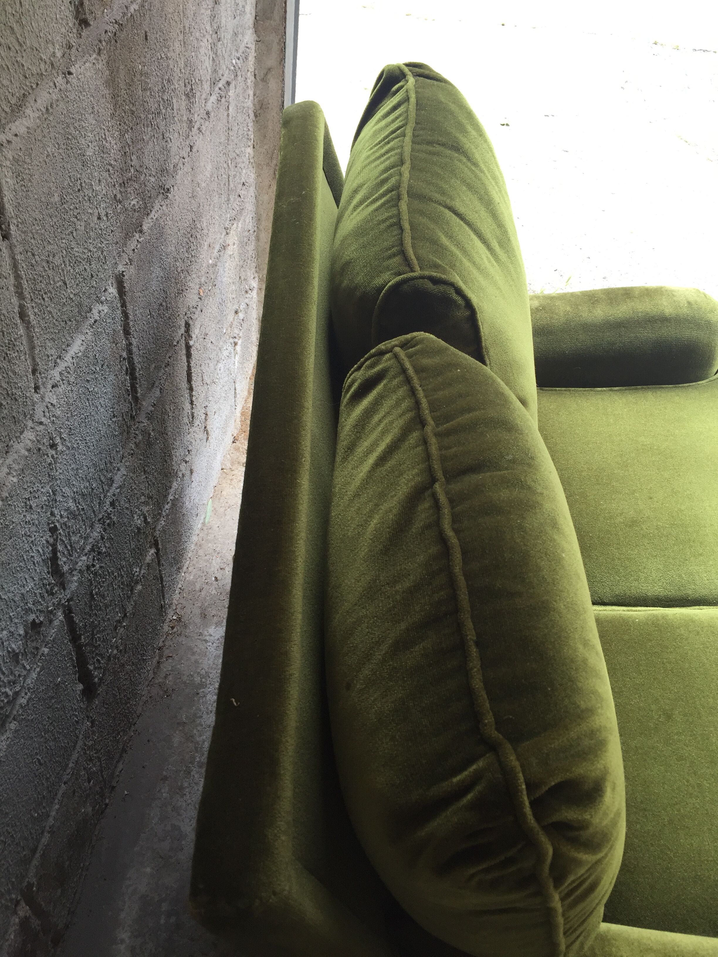 Vintage green velvet sofa