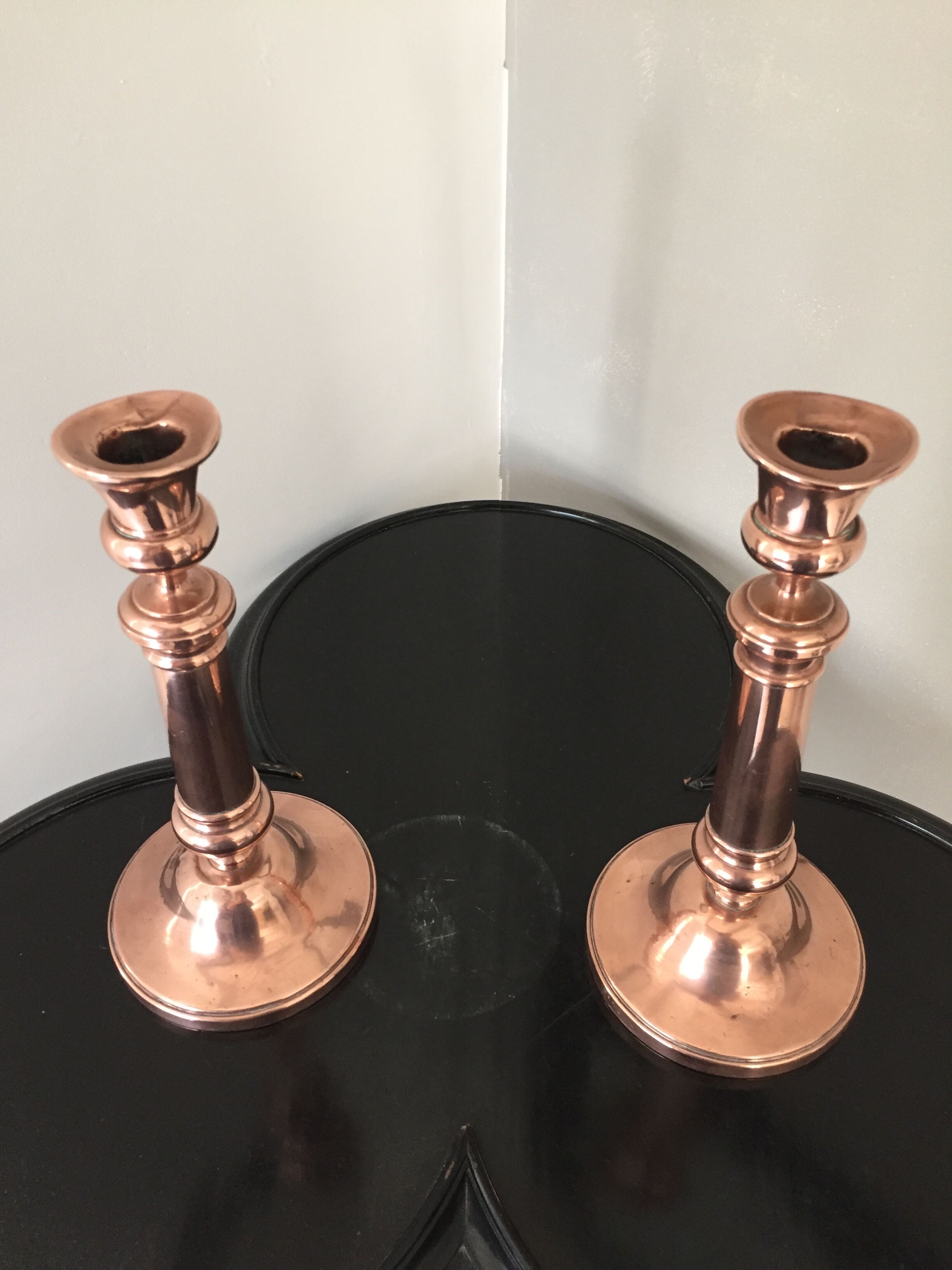 Pair of pink copper candlesticks