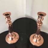 Pair of pink copper candlesticks
