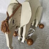 Wooden elephant on wheels