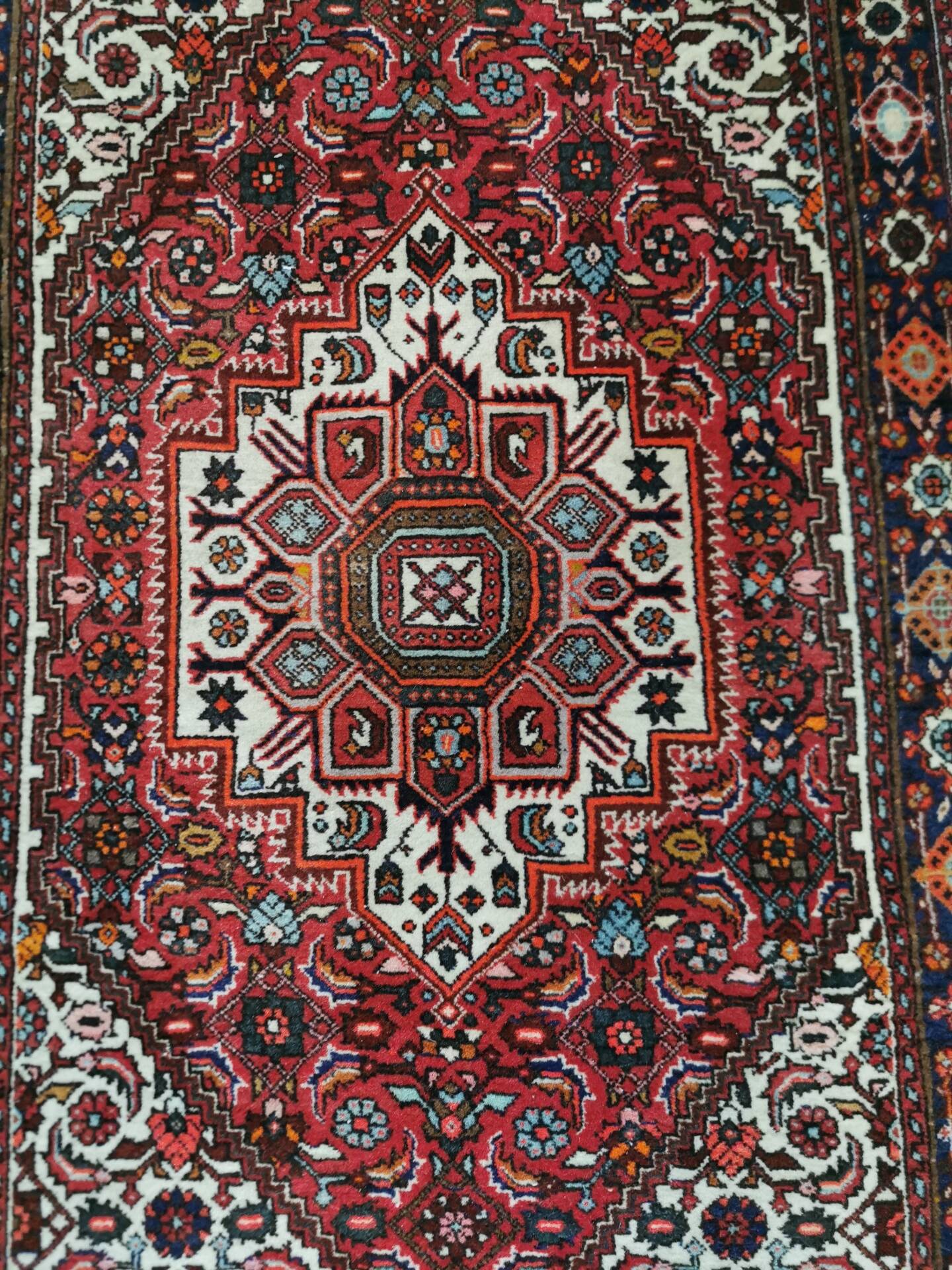 Hand-knotted Persian carpet from Iran, 128 x 76 cm.