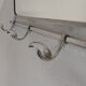 Art Deco wall coat rack with a bevelled mirror adjustable in a chrome frame, 1930s.