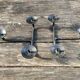 Brutalist cast iron candle holders.