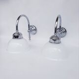 Swan neck and white glass wall lights