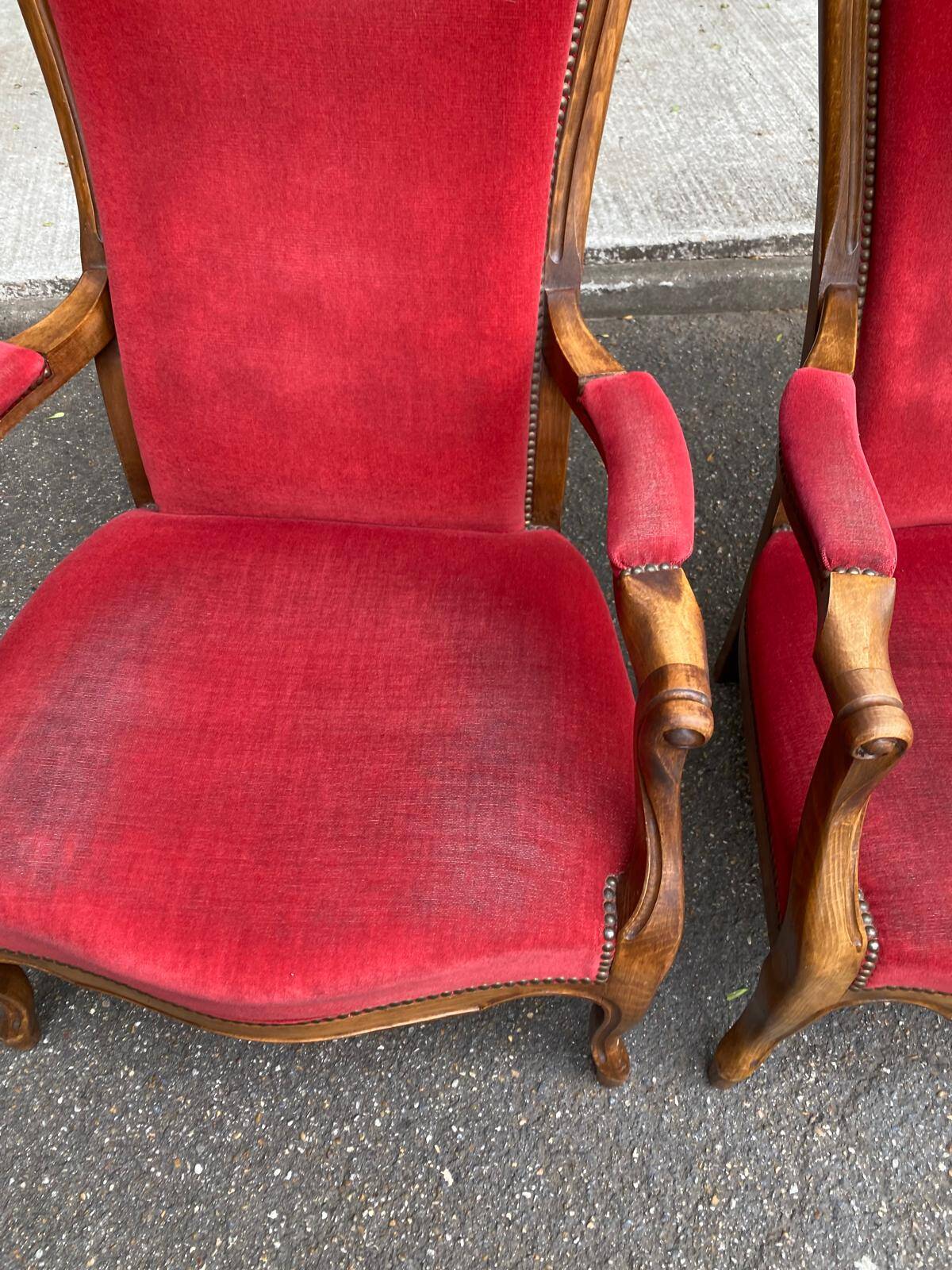 2 Louis Philippe cabriolet armchairs in burgundy velvet wood from the 19th century.
