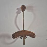 Vintage 1960s wall coat rack in wood and metal.