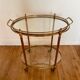 Vintage serving trolley in gilded brass and glass