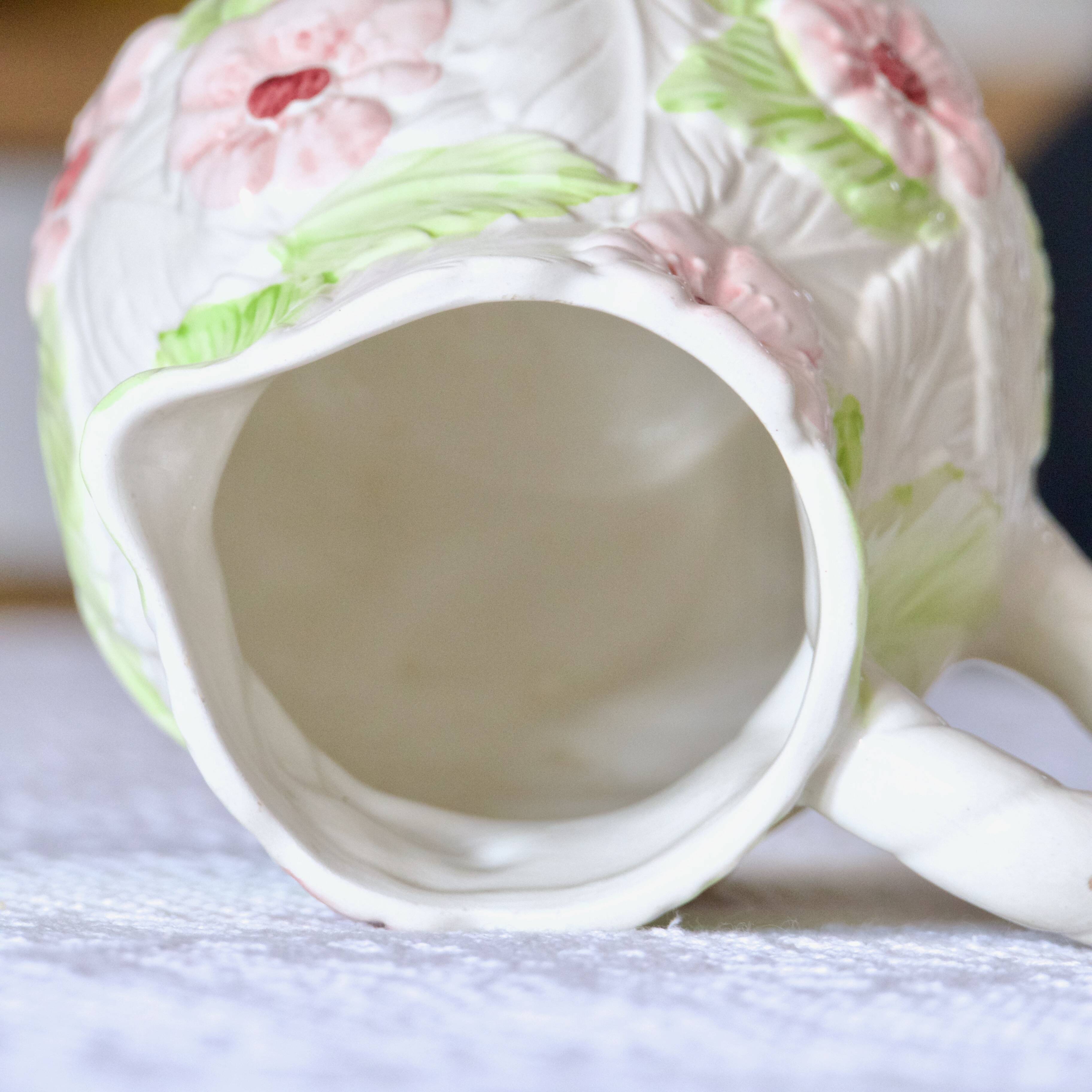 Hand-painted floral slip carafe