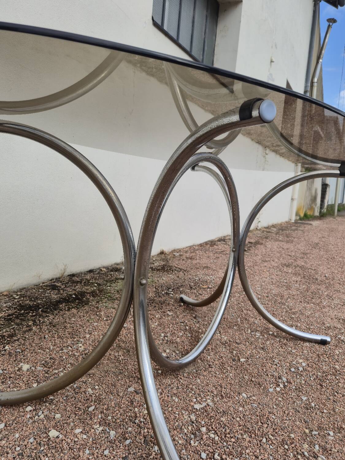 Vintage oval design table in smoked glass and chrome legs