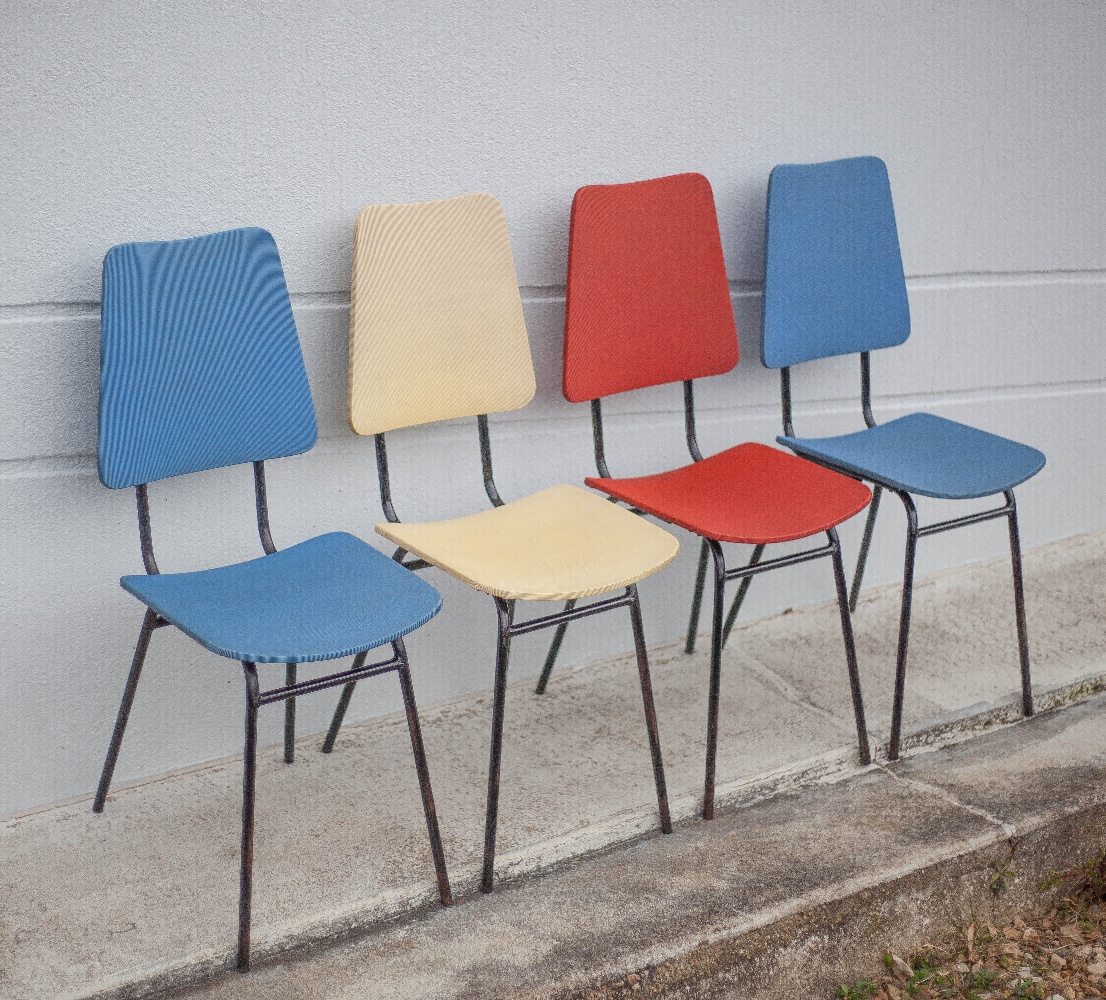 Set of 4 vintage chairs in metal and vinyl