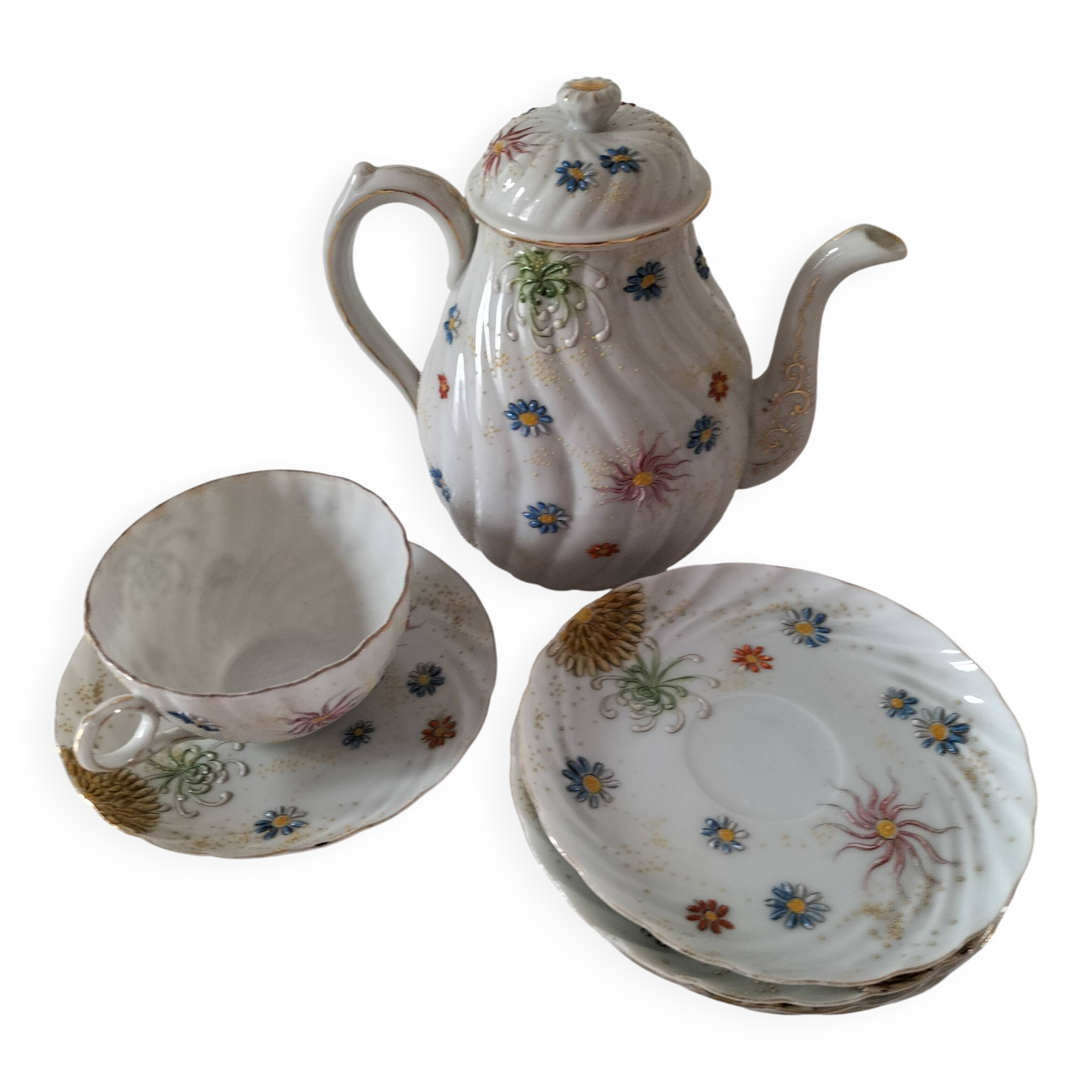 coffee pot, cup and saucers