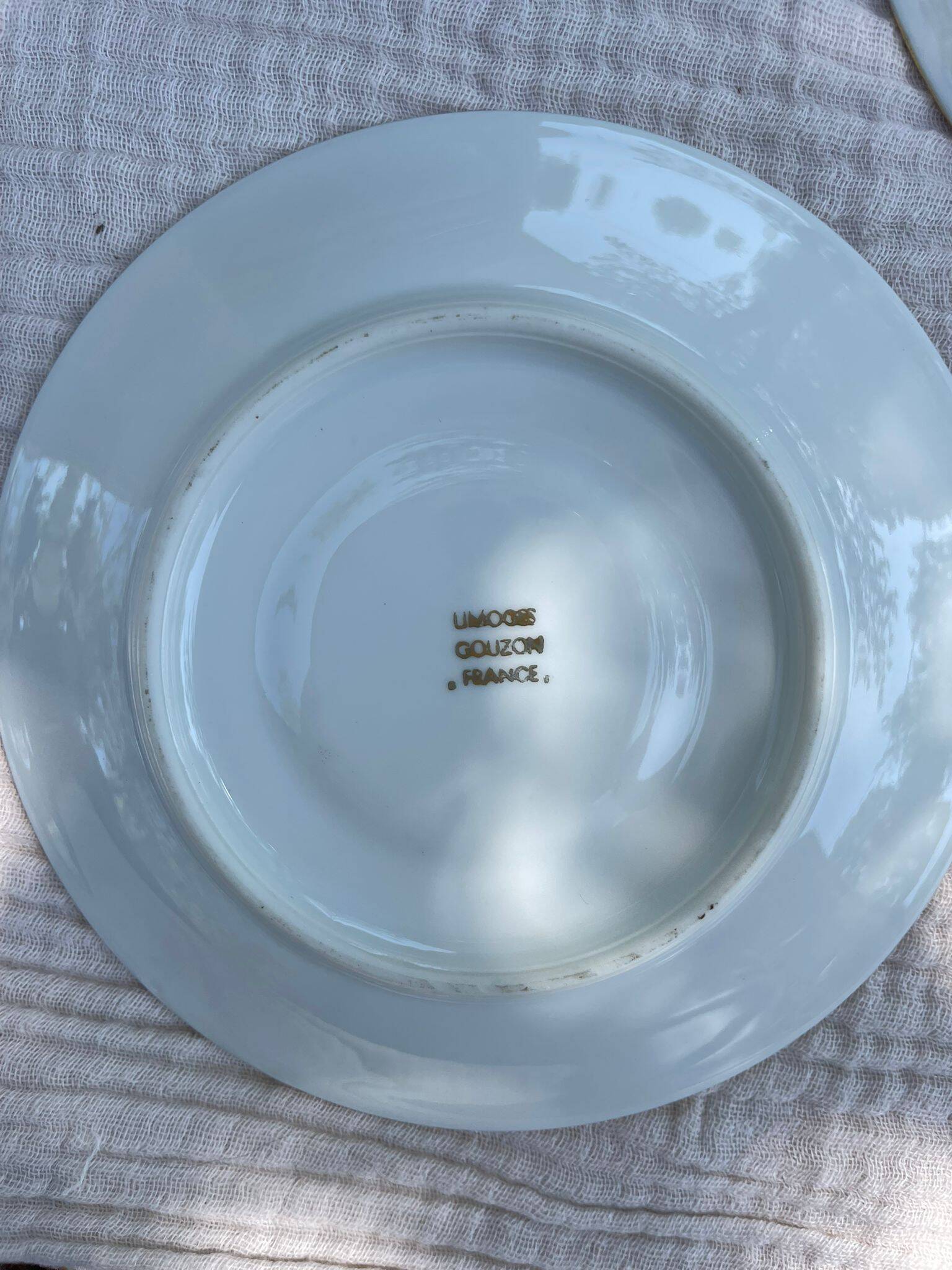 Porcelain set of small plates golden Limoges France