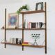 Danish wall shelving system in teak from the 1960s.