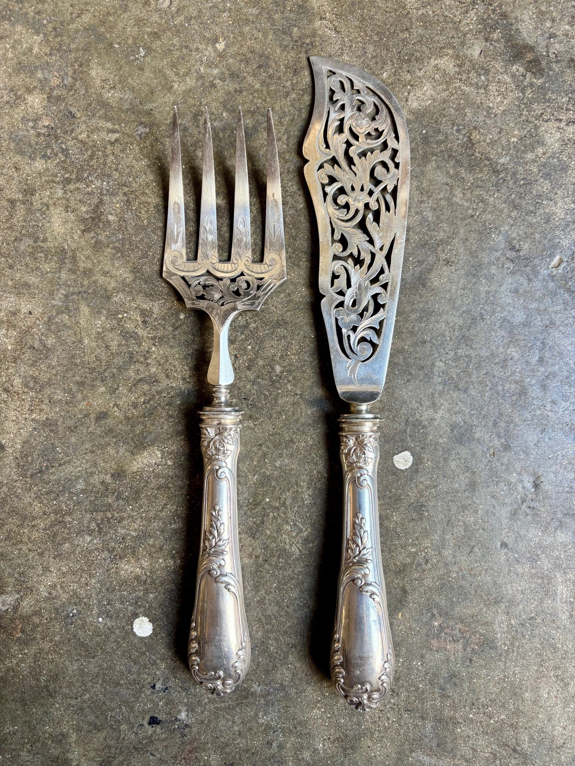 2 silver openwork service cutlery sets engraved with "AS"