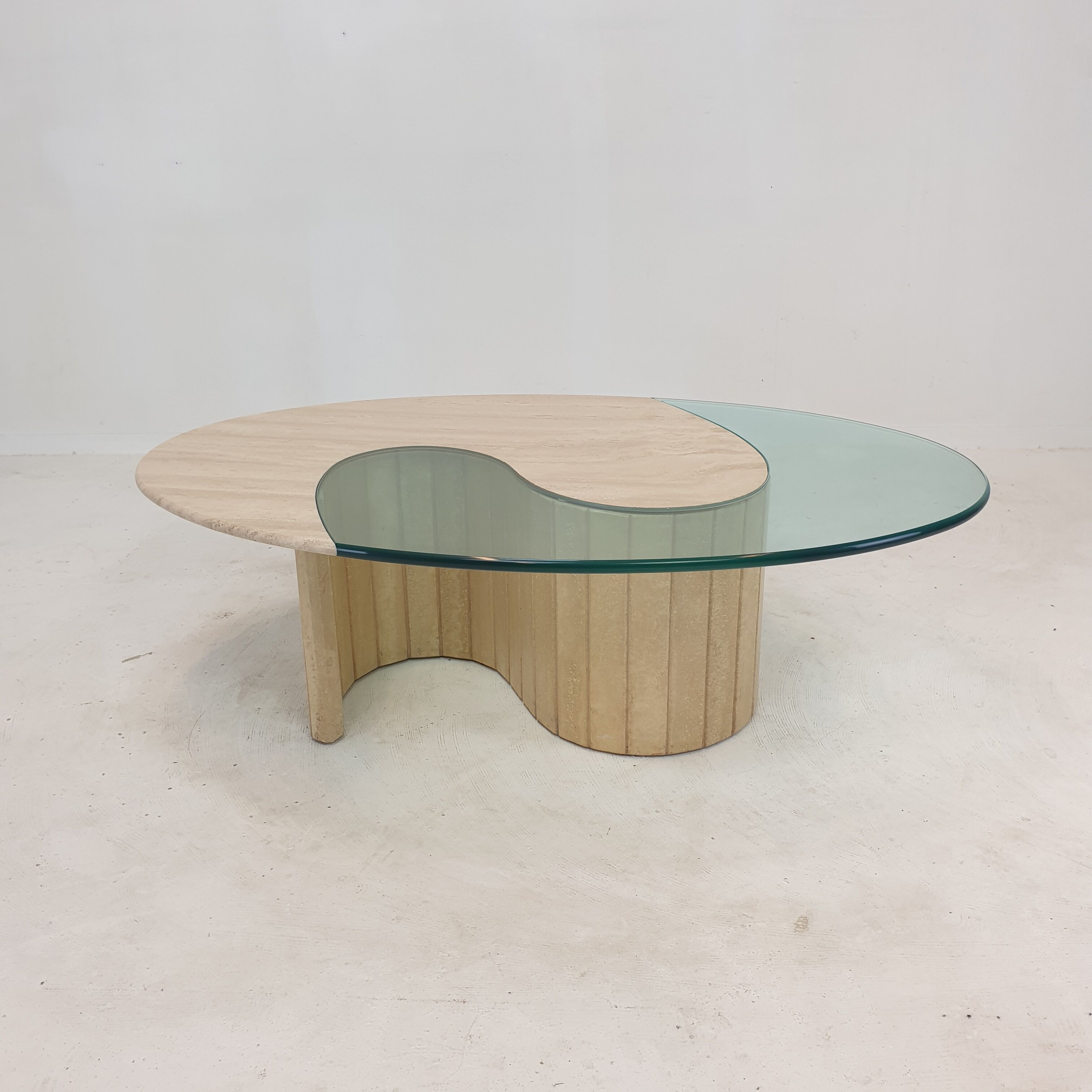 Italian travertine and glass coffee table, 1980's