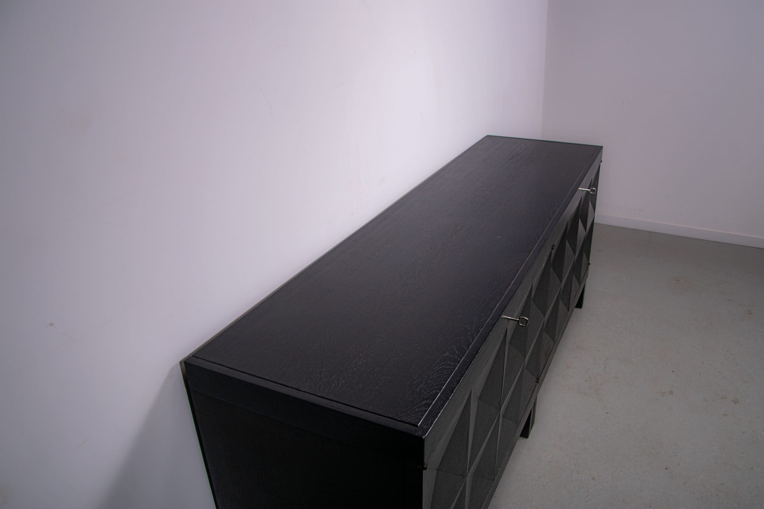 Black oak brutalist sideboard by Jean Batenburg with graphical doors for MI, Belgium