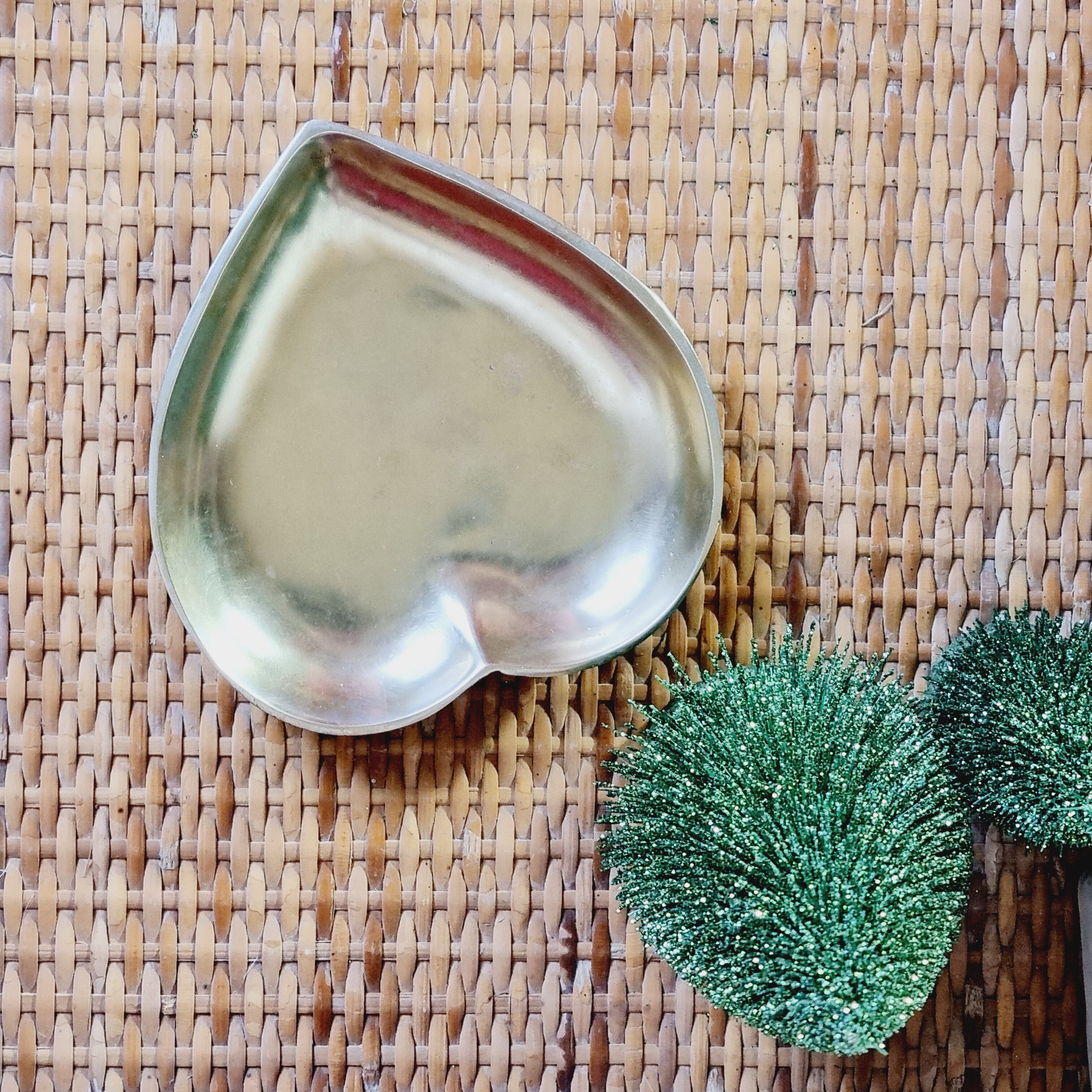 Empty brass heart pocket