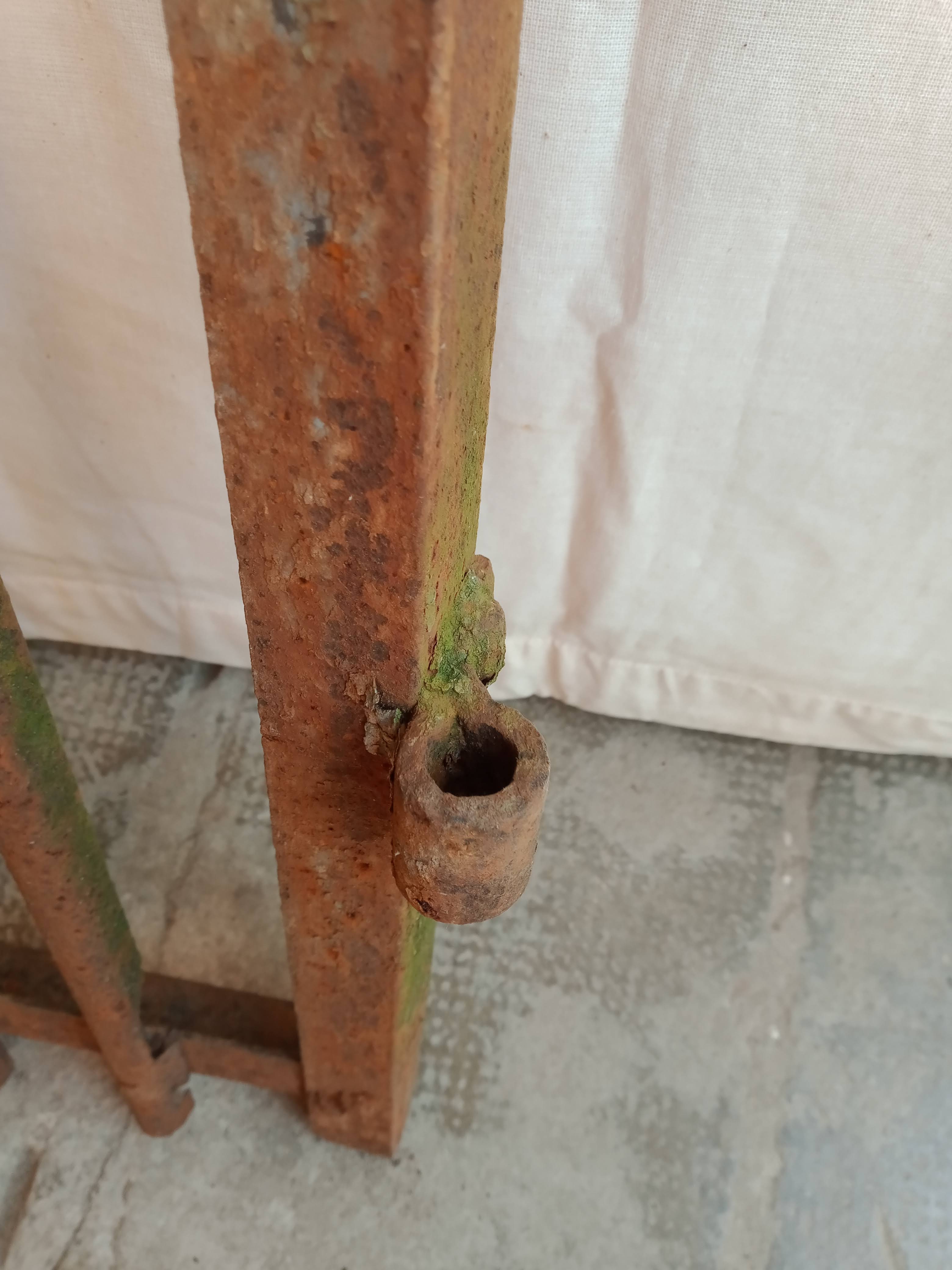 Old riveted metal gate