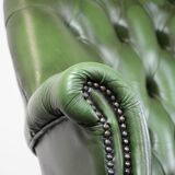 Large green cowhide Chesterfield office chair in English style on wheels