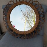 Vintage mirror in rattan flowers, sun