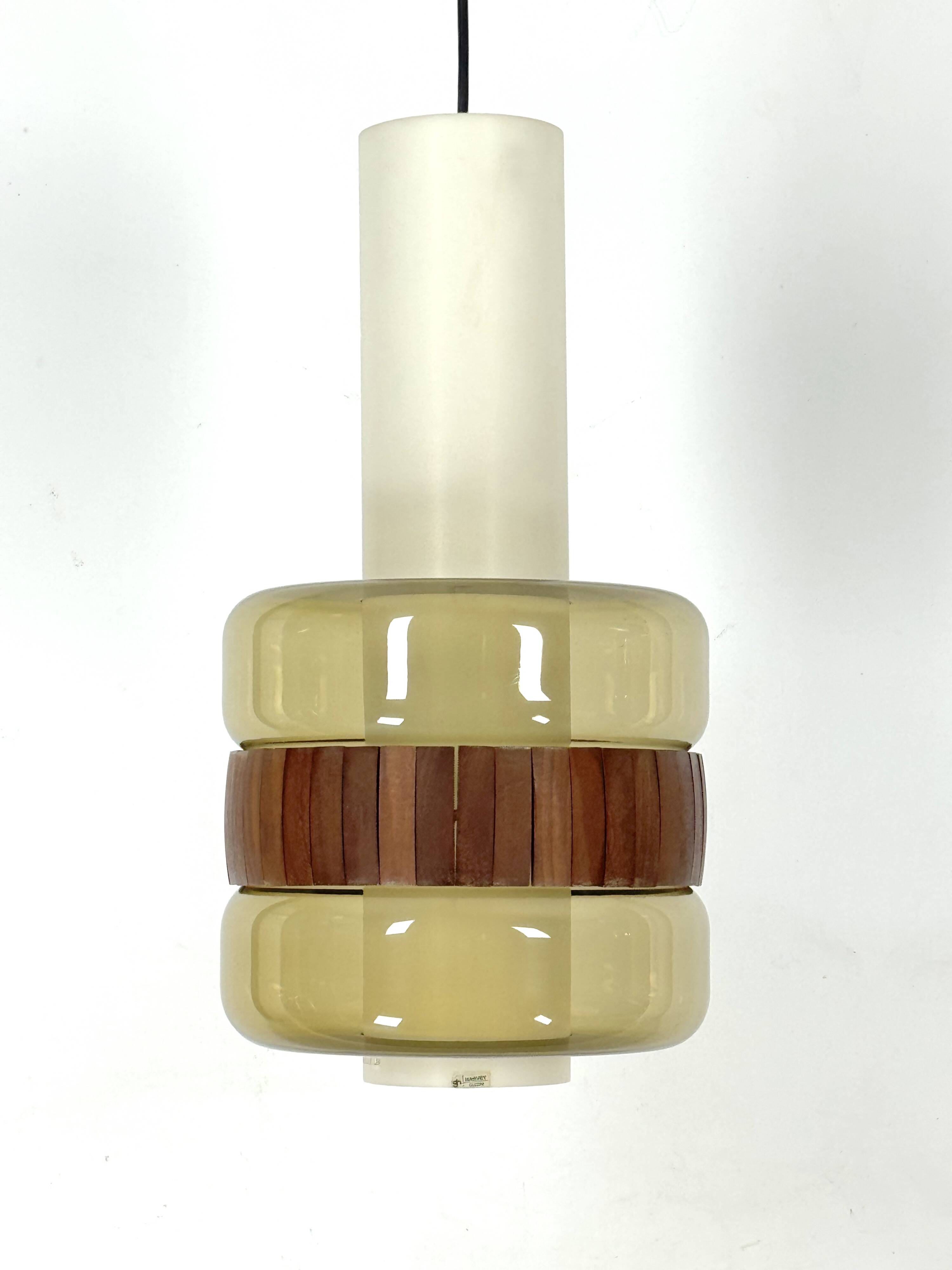 Mid-Century Harvey Guzzini pendant from 1960s. Labeled.