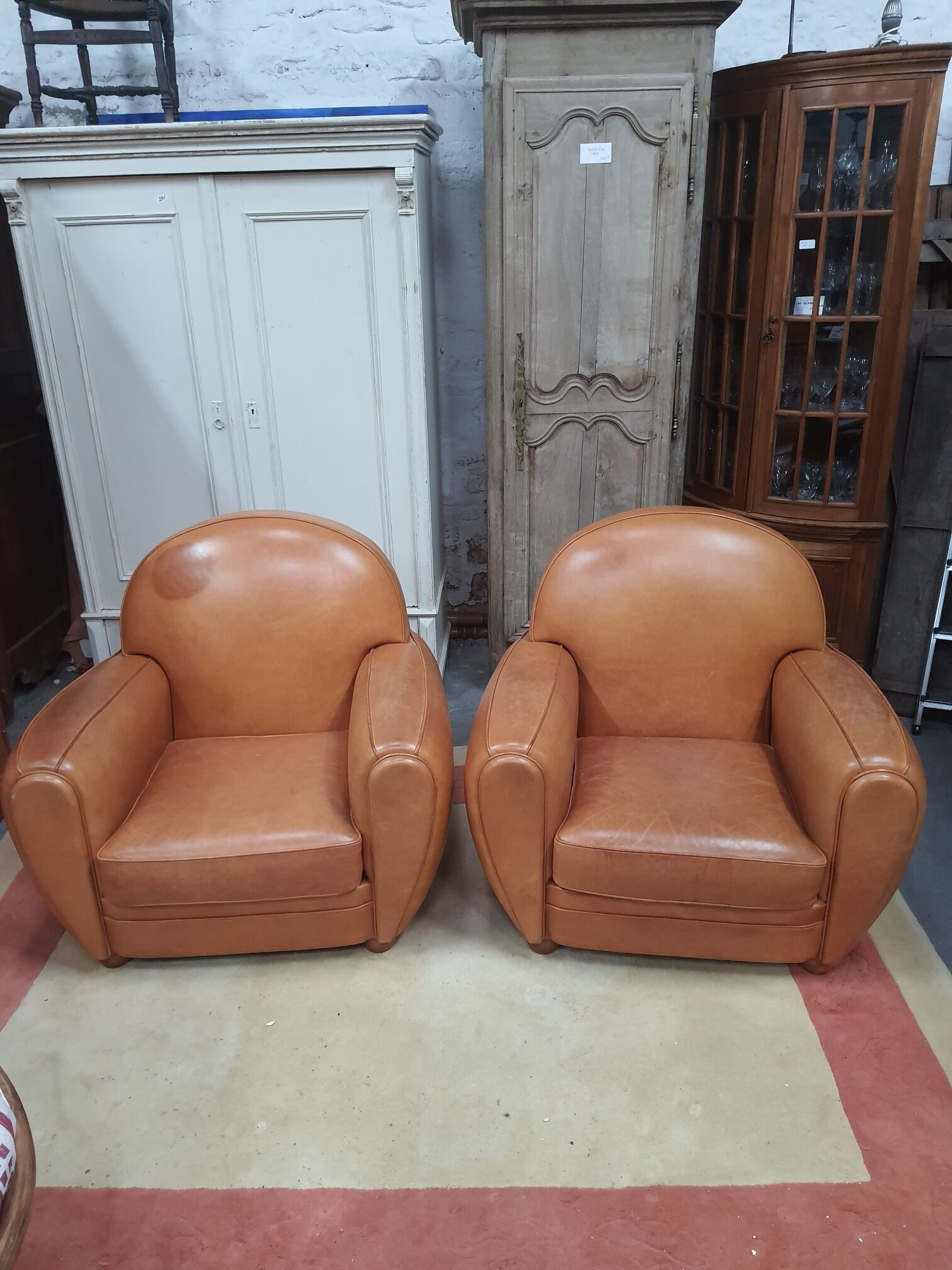 Pair of leather club chairs