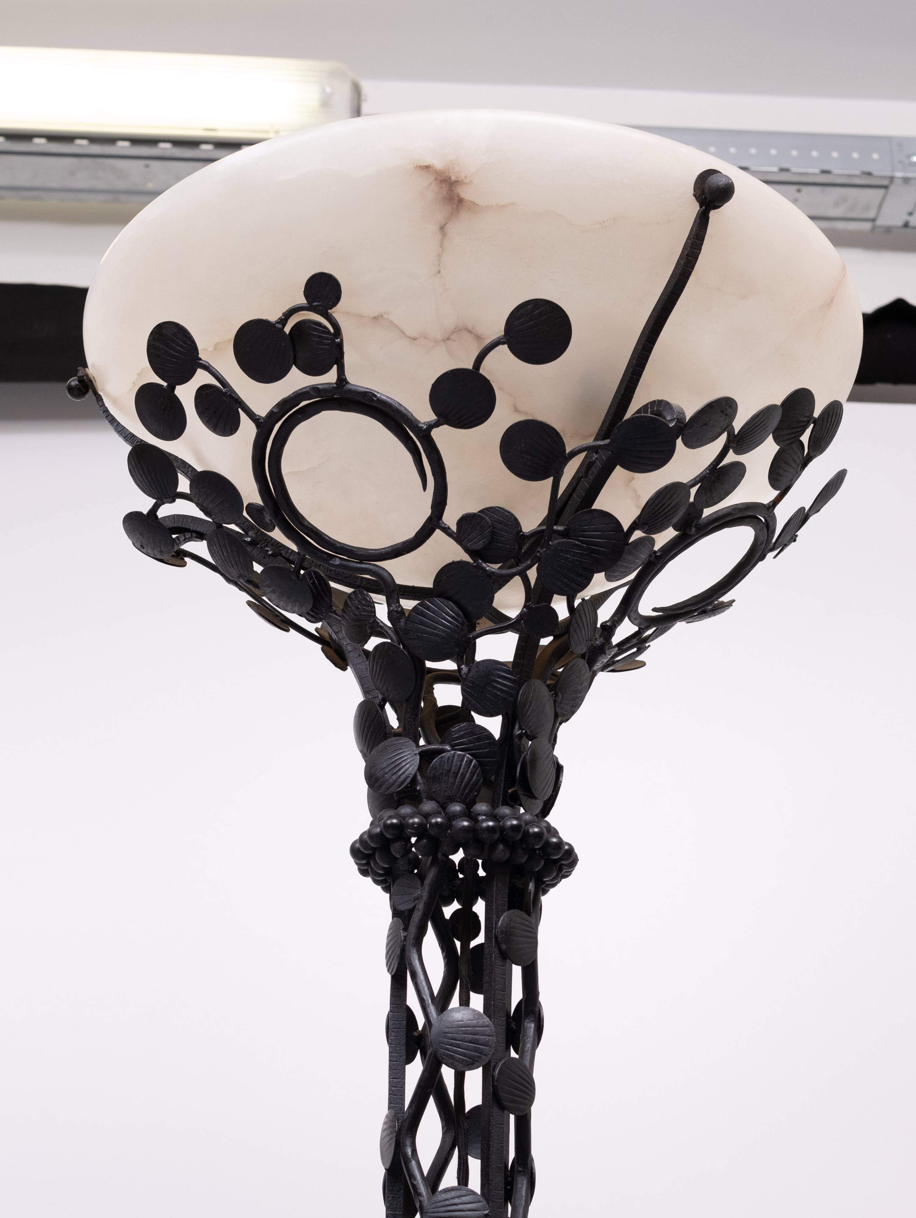 Edgar Brandt style Art Deco floor lamp in wrought iron with alabaster cup
