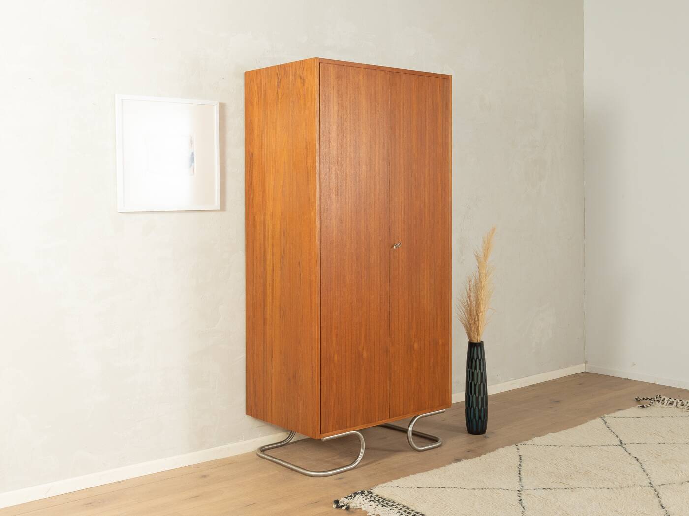 Purist wardrobe from the 1960s in teak veneer by DeWe