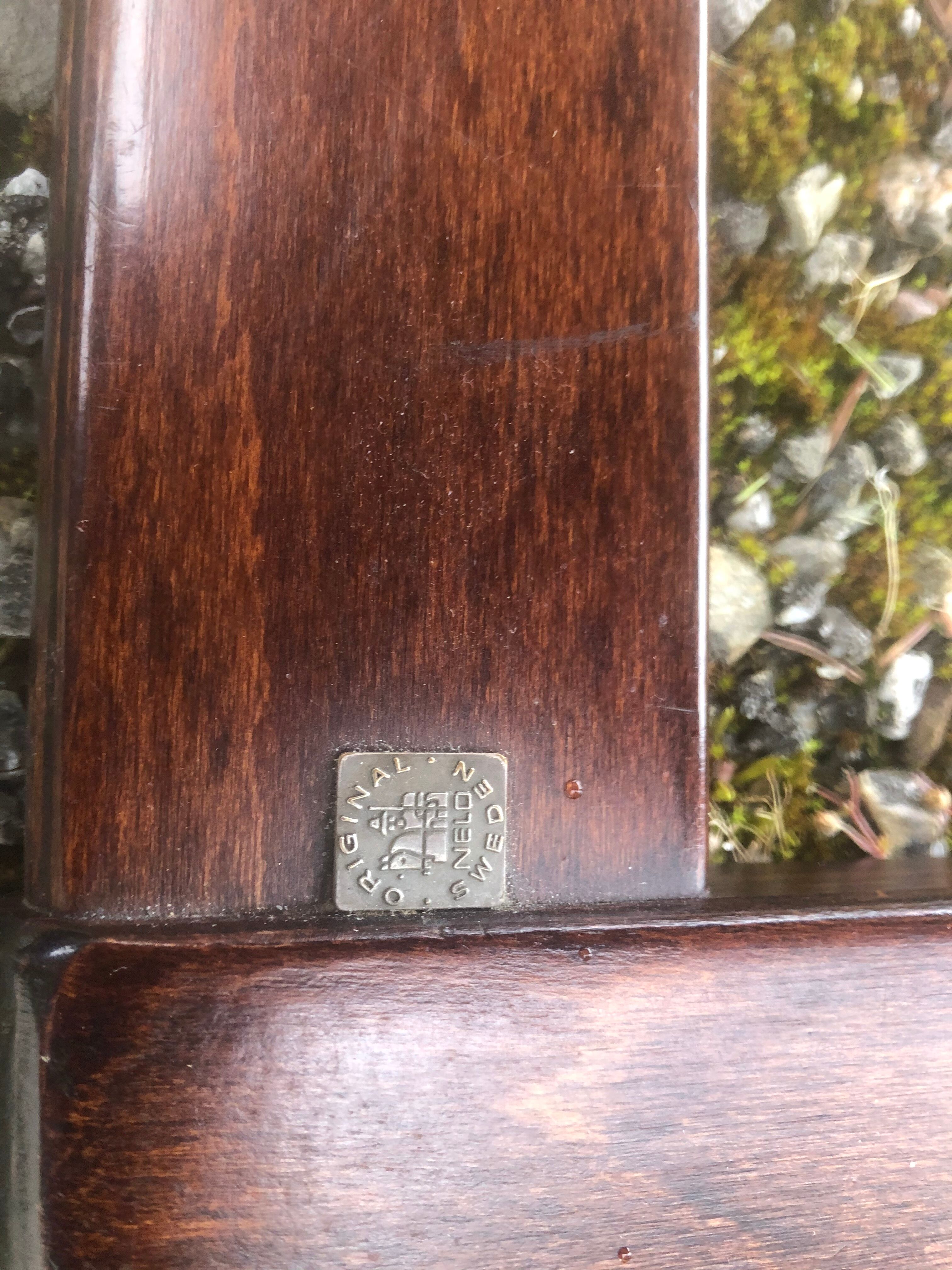 Armchair with its designer footrest Nelo Sweden