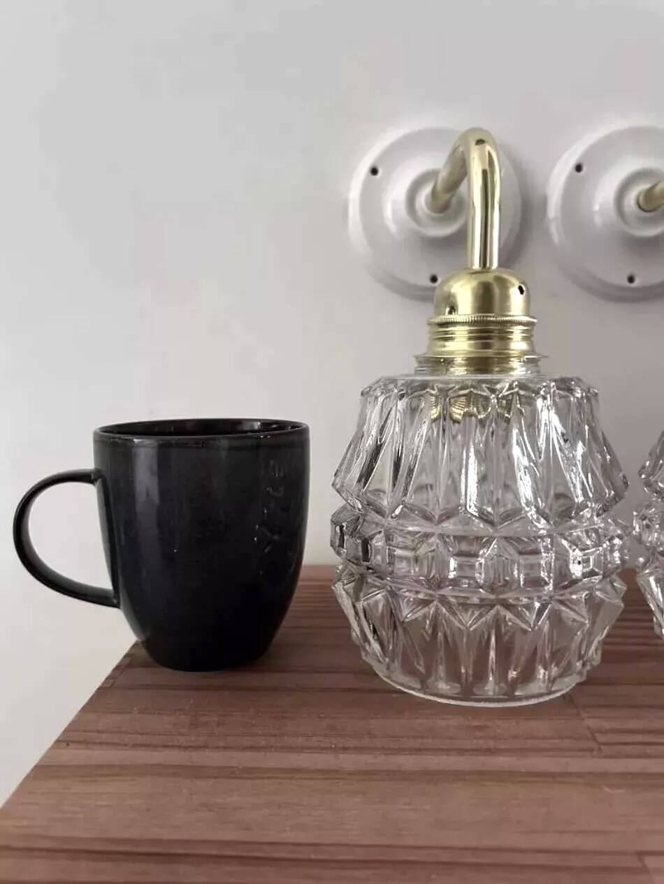 Pair of ceramic and glass wall sconces