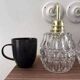 Pair of ceramic and glass wall sconces