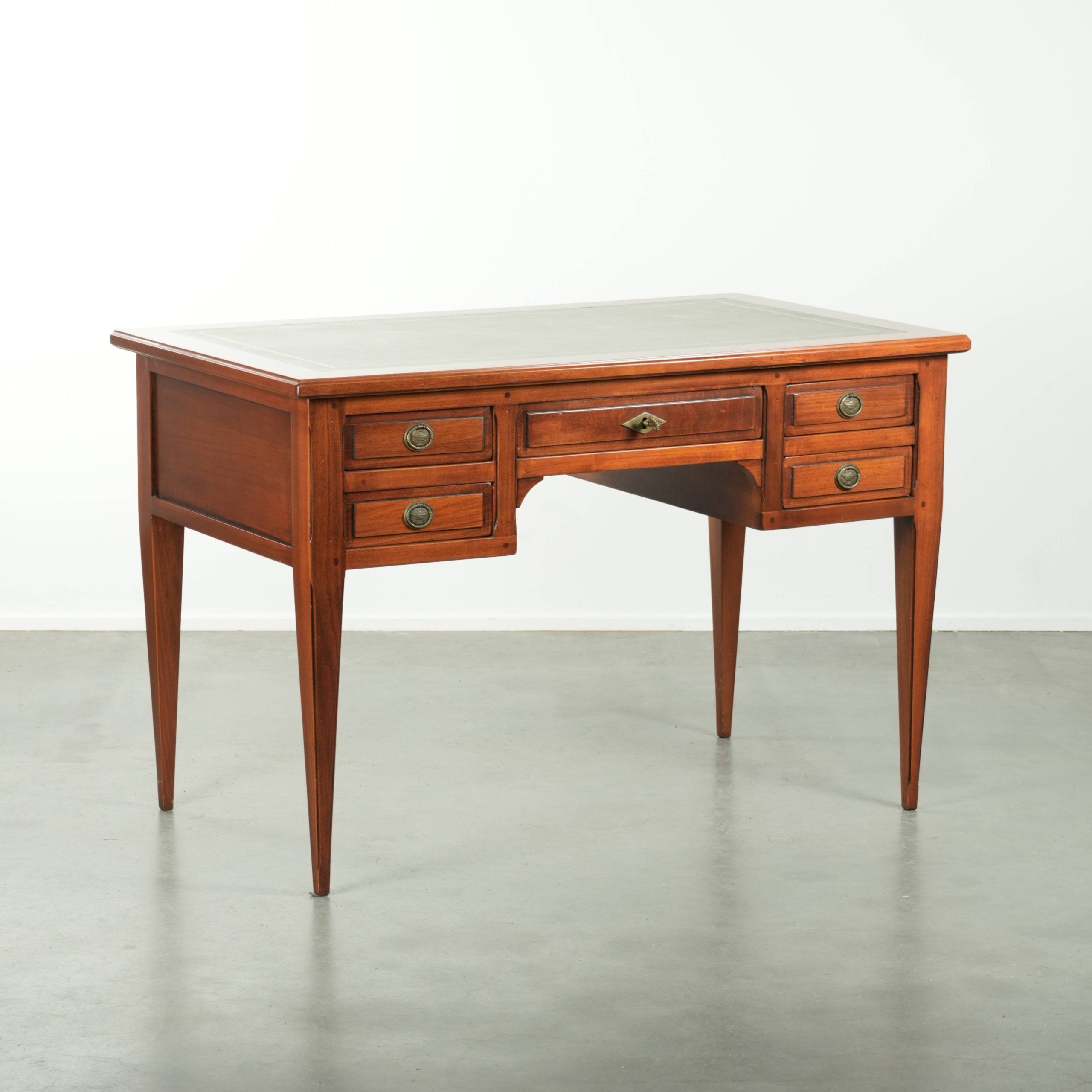 Elegant English style desk with green leather top, gold details and drawers