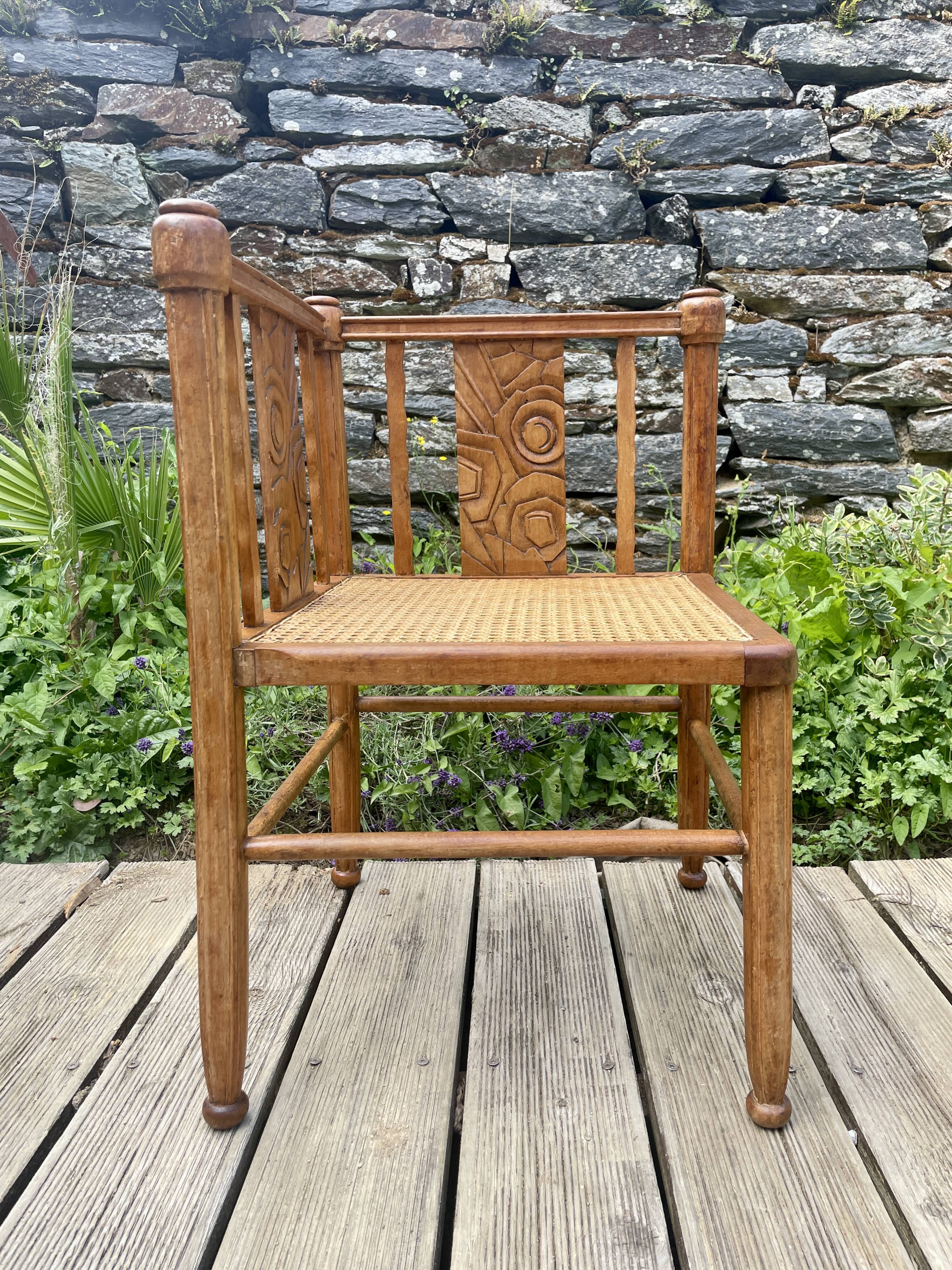 Art Deco corner chair with caning