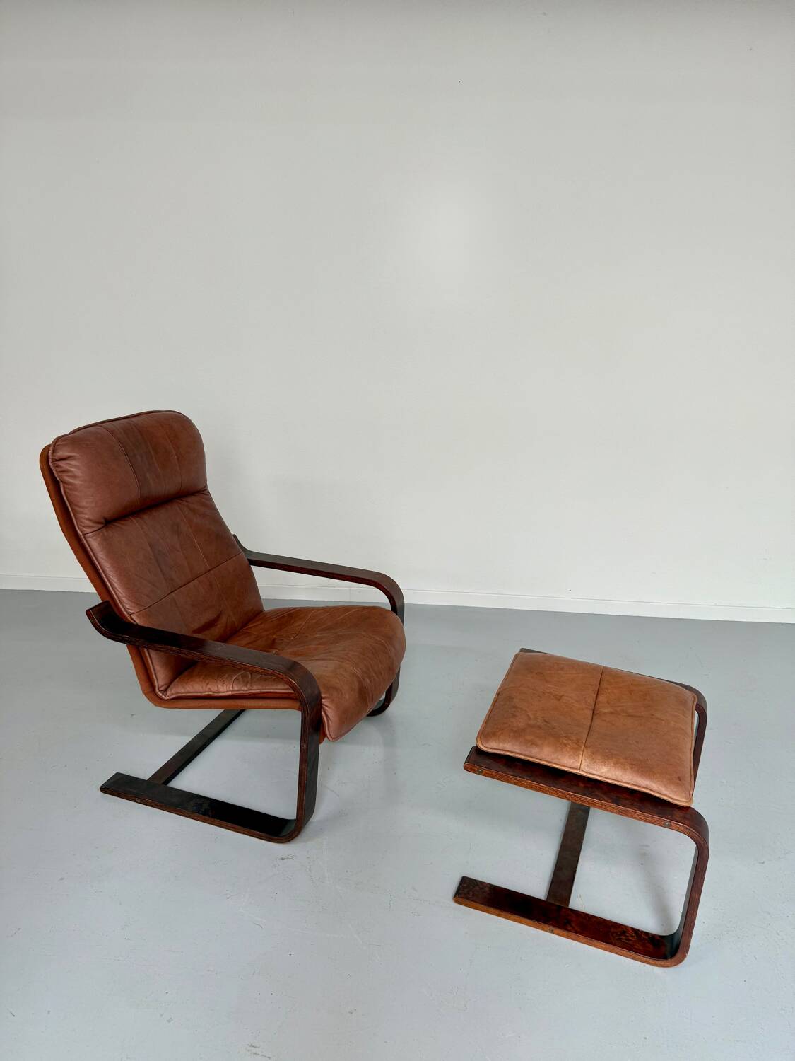 Yngve Ekström 70 Scandinavian design armchair with leather and wood ottoman