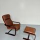 Yngve Ekström 70 Scandinavian design armchair with leather and wood ottoman