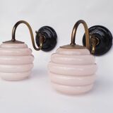 Swan neck wall lights in brass and glass