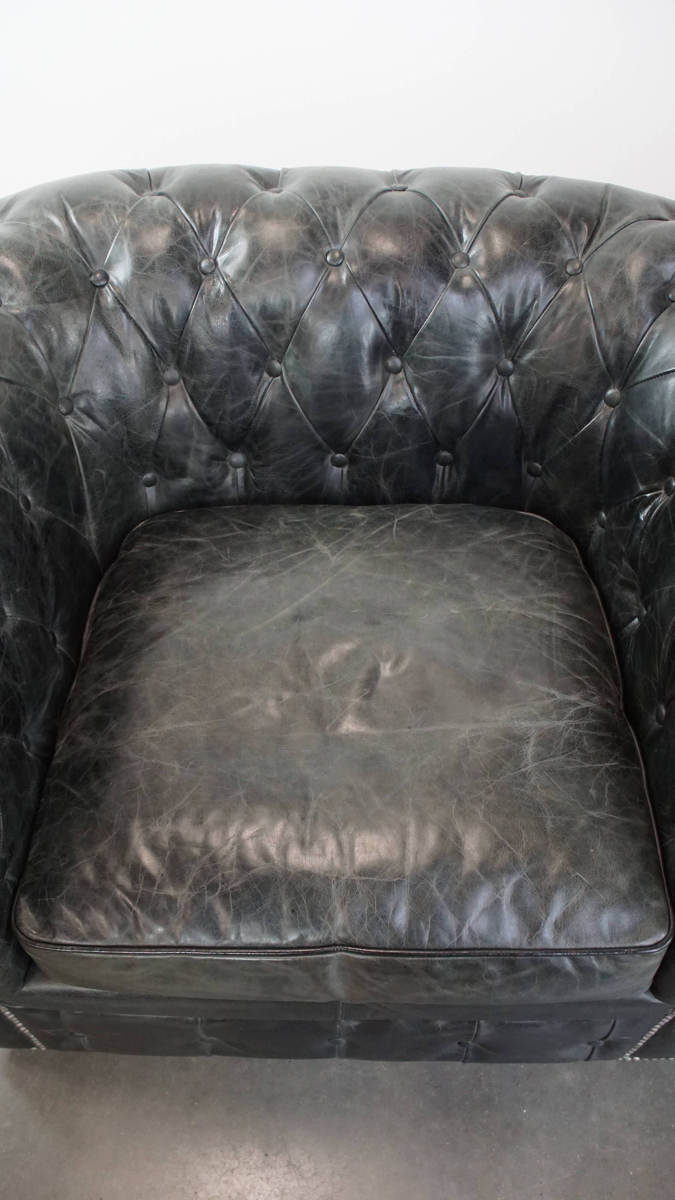 Set of 2 black Chesterfield armchairs in grained cowhide leather