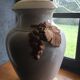 Ceramic lamp in the shape of a bunch of grapes.