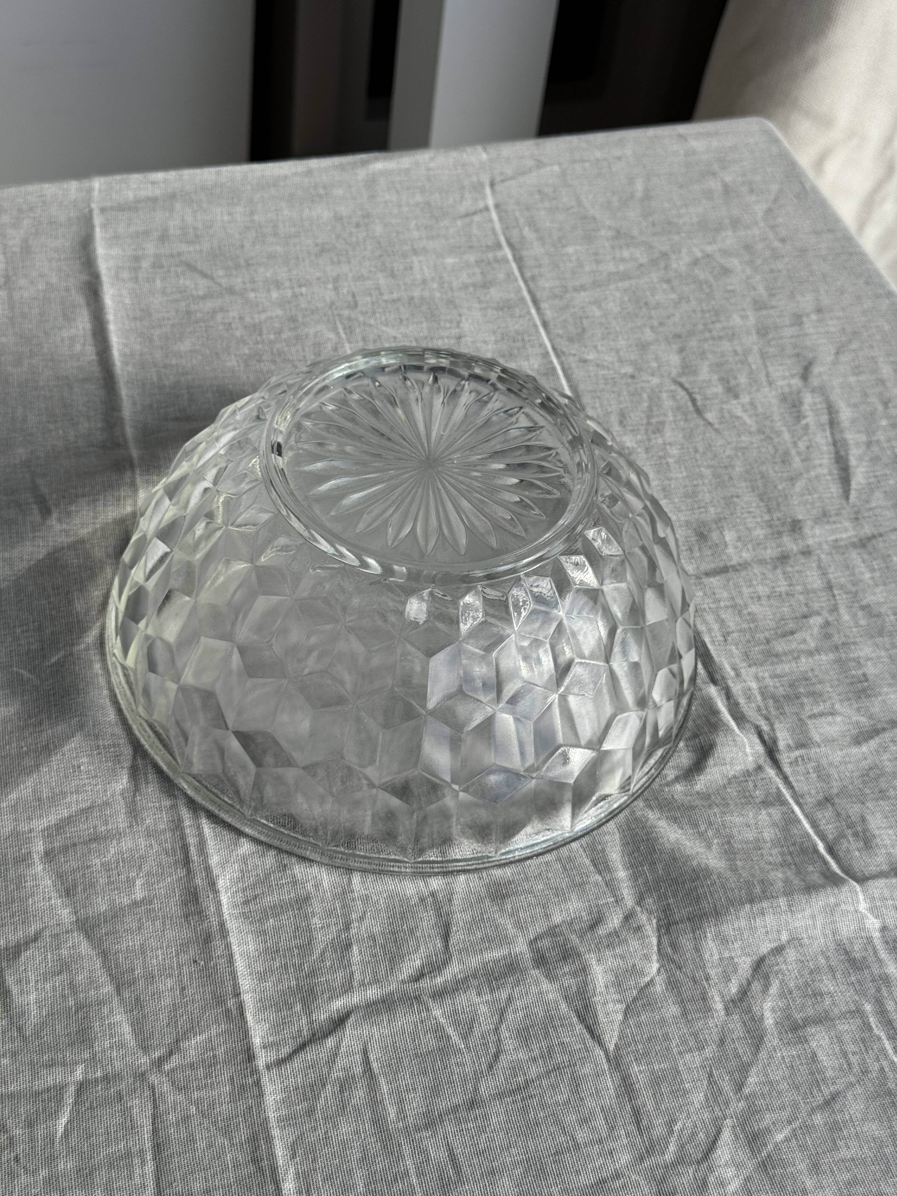Small vintage glass bowl with a cube pattern.