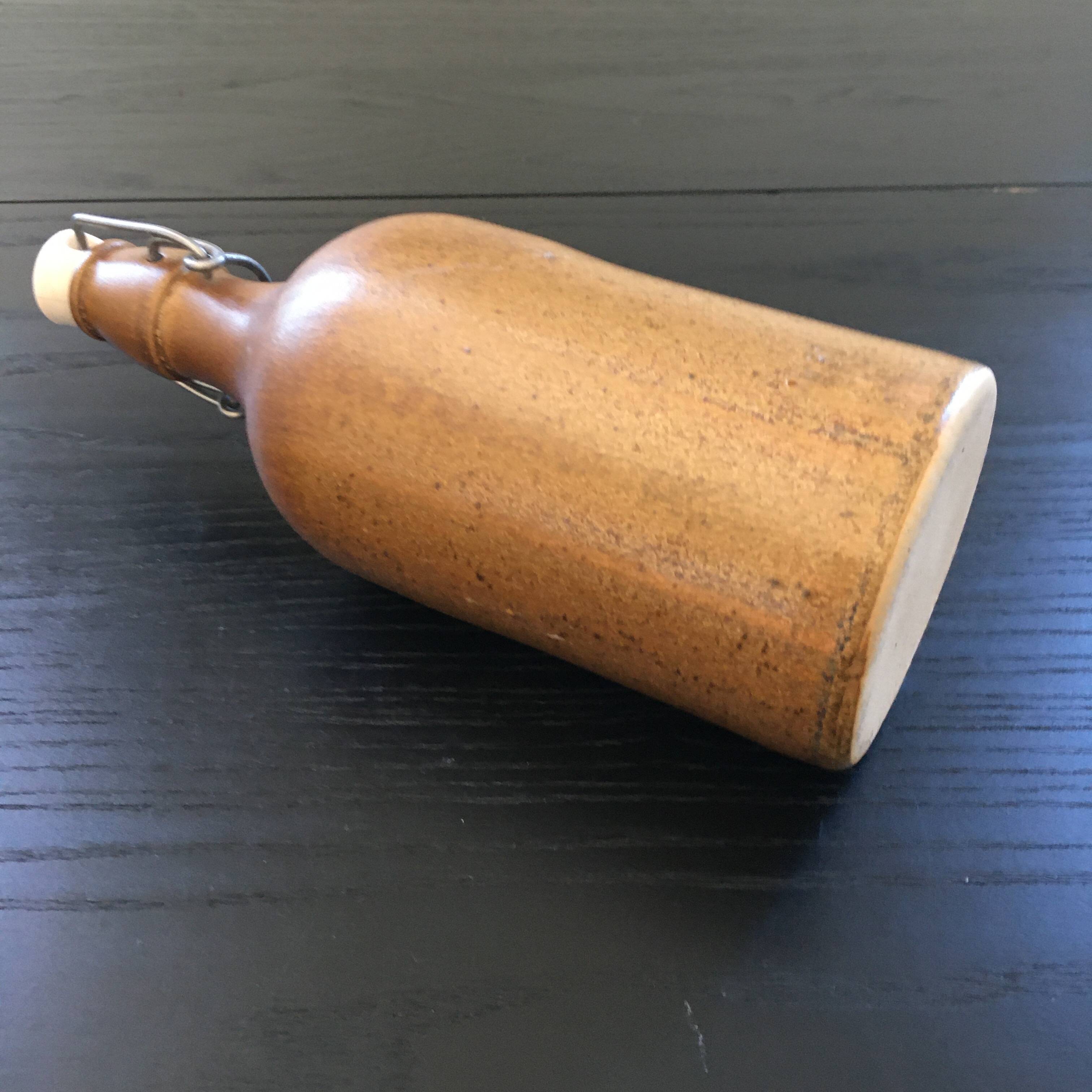 Beige stoneware bottle
