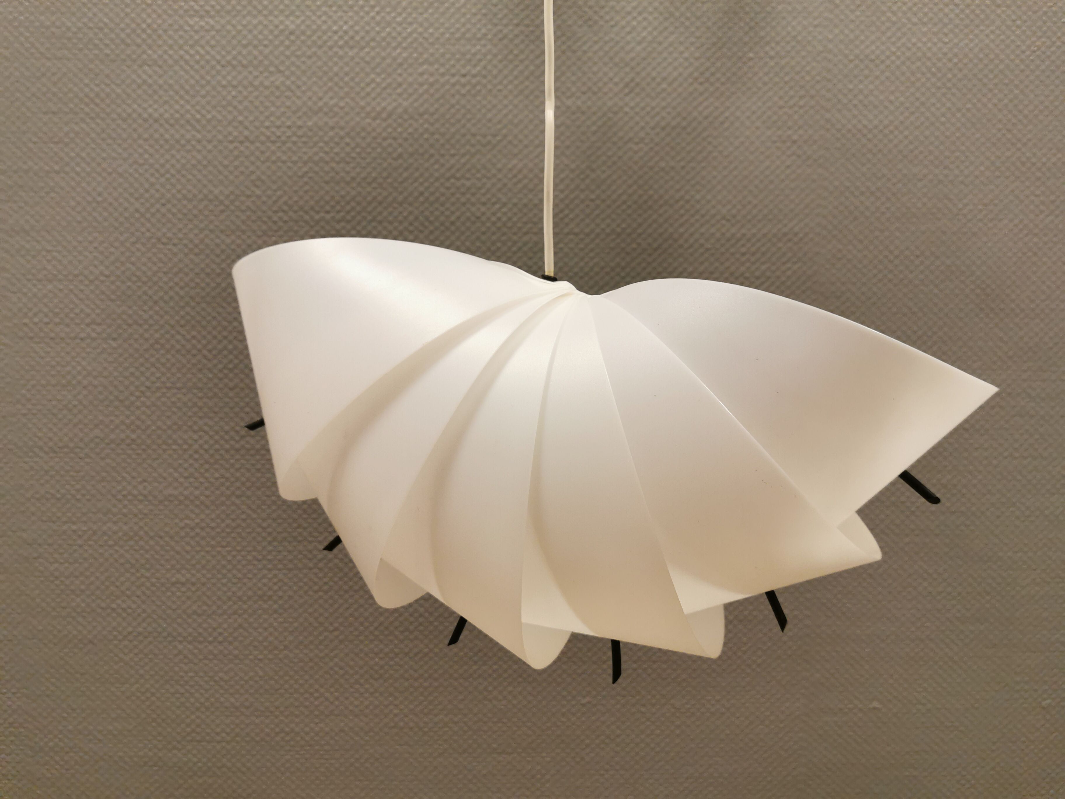Danish conch, snail shell hanging lamp from the 80s, made of hard ABS plastic.