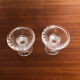 Old pair of vintage round molded glass candle holder