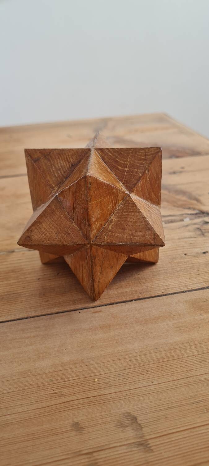 Sacndianve teak paperweight