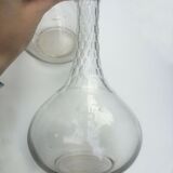 Pair of crystal decanters with cut collar and engraved body with R monograms
