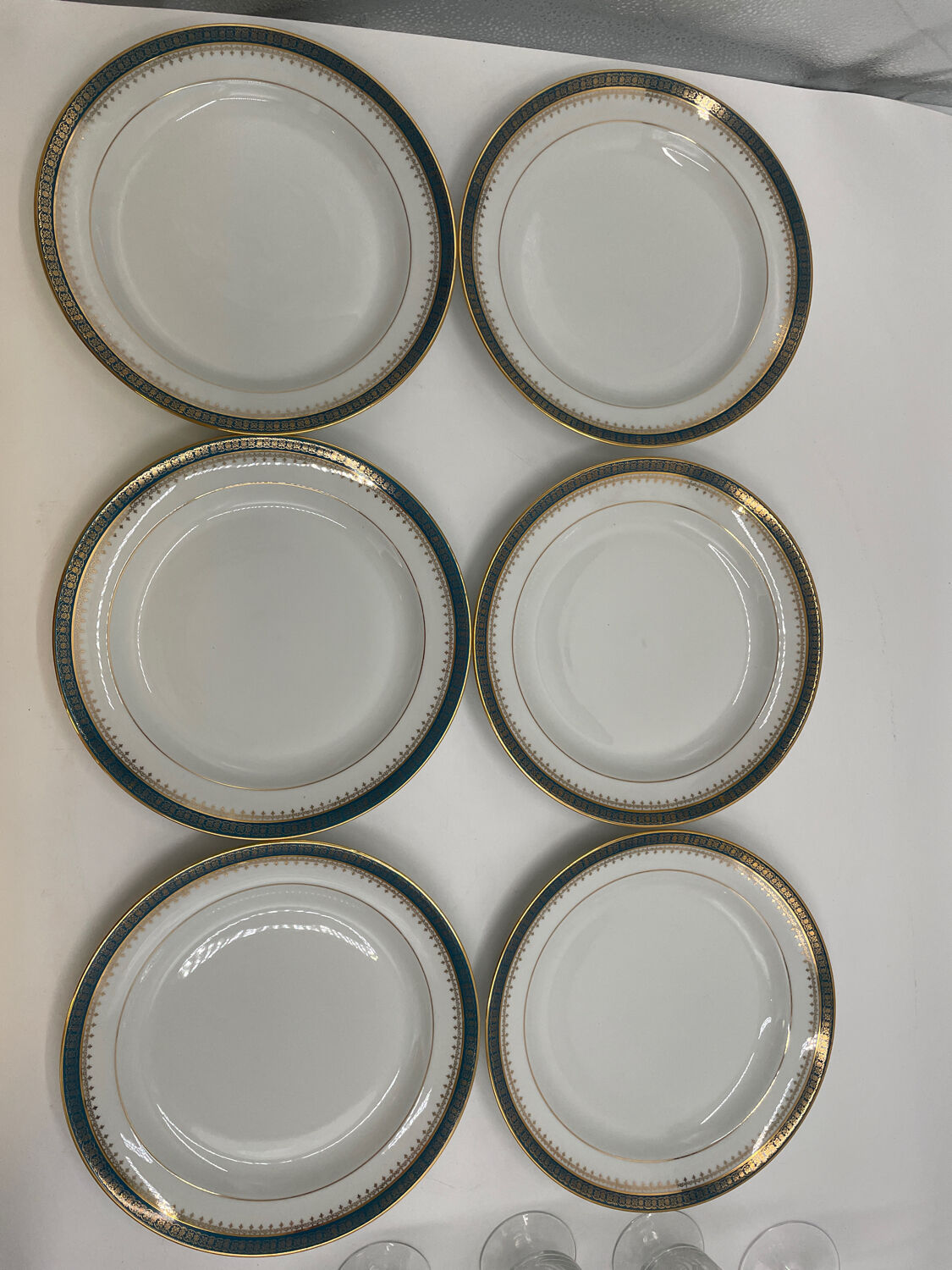 Six slightly hollow Limoges porcelain plates.