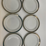 Six slightly hollow Limoges porcelain plates.