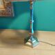 Silver metal lamp with its lampshade